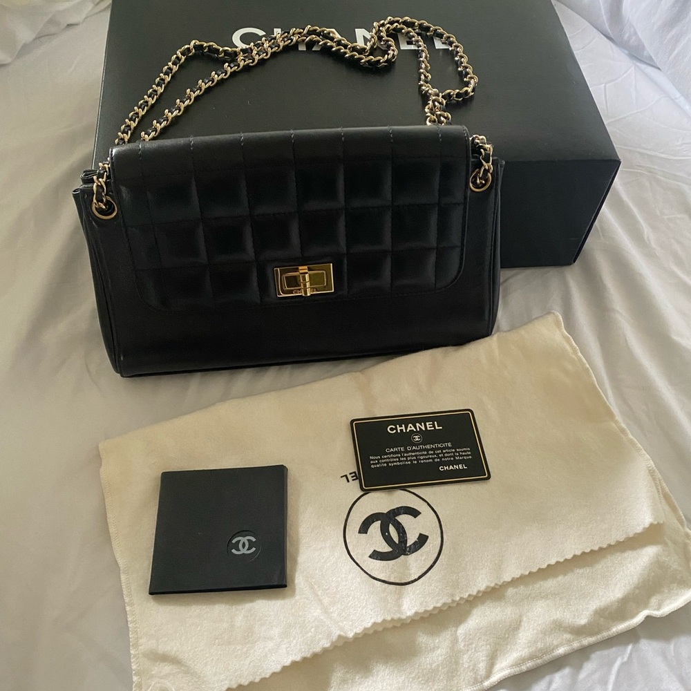 Authentic black leather quilted Chanel accordion quilted flap bag